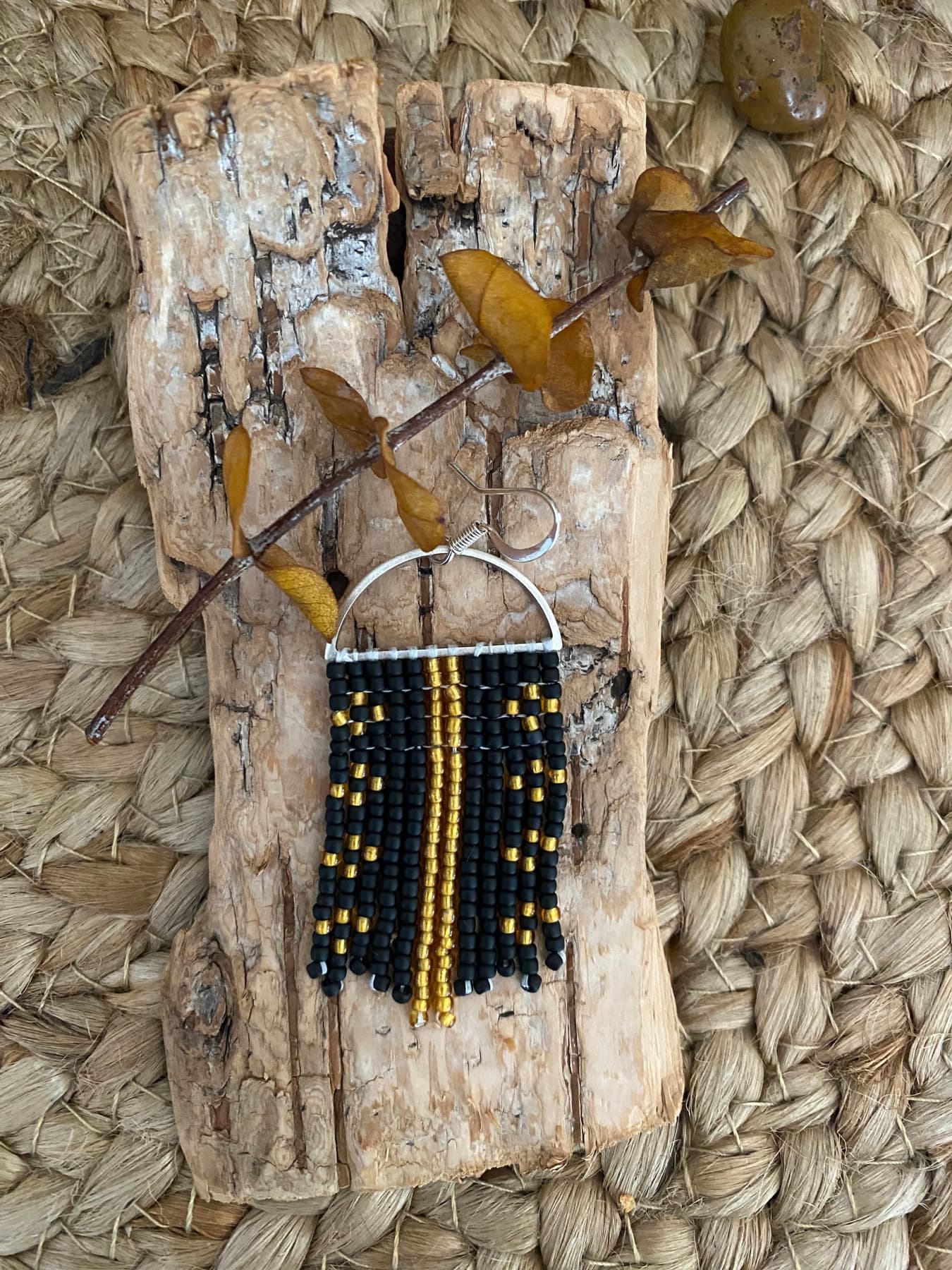 Black and gold hand-beaded fringe earring