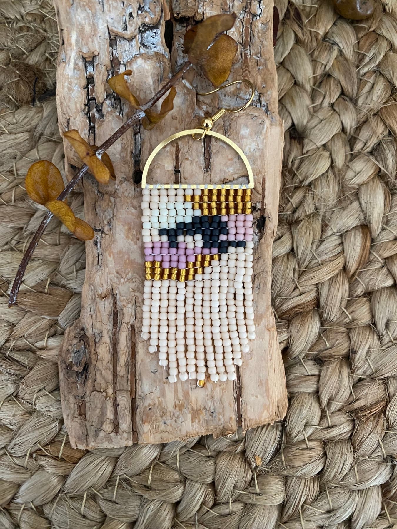 Cream, lilac, black, and gold hand-beaded fringe earring