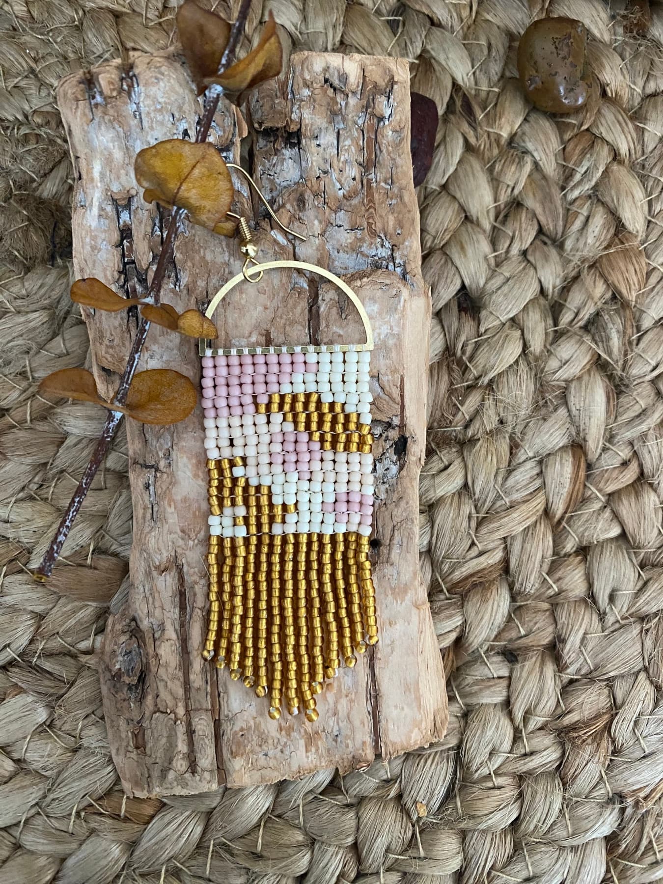 Pink, cream, and gold hand-beaded fringe earring